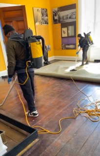 Crew performing floor care in an office